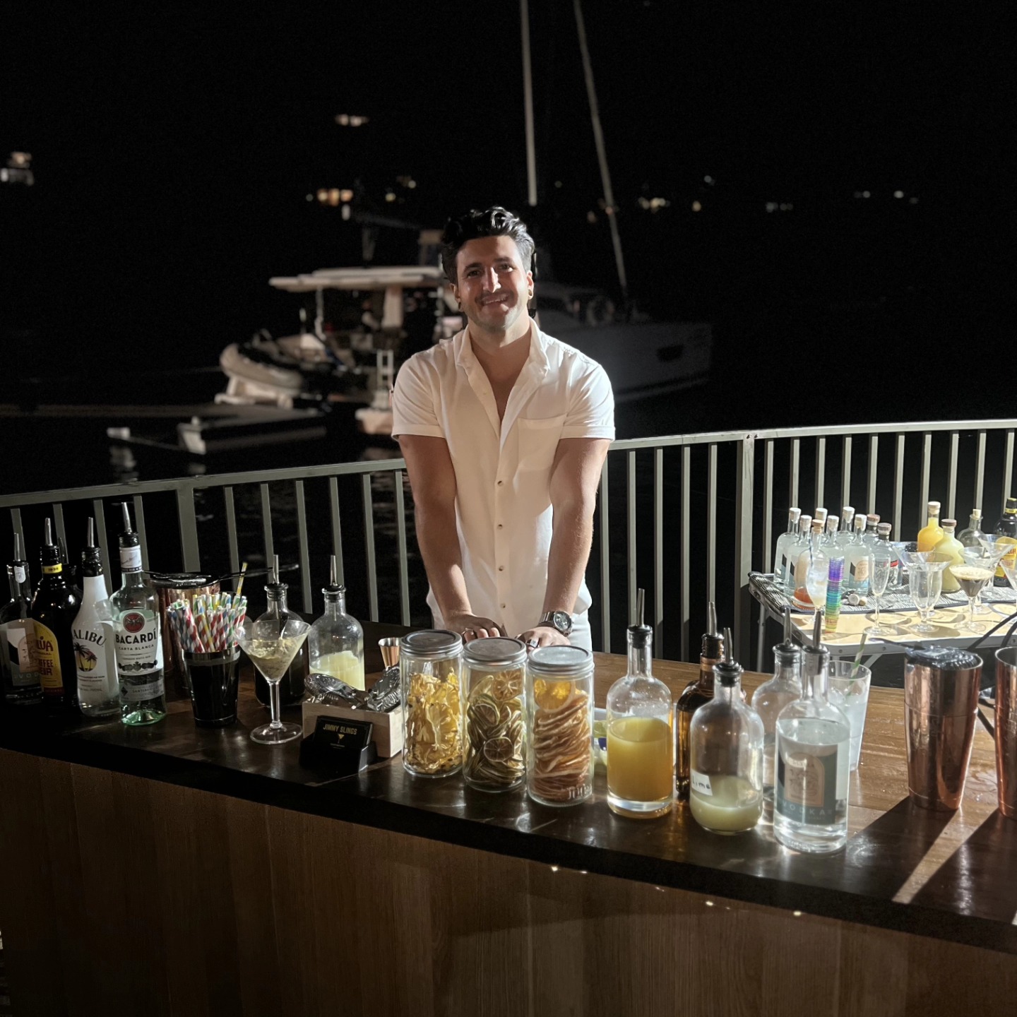 Mobile bar on a marina at dusk