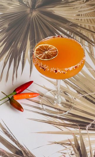 A coupe handed across the bar