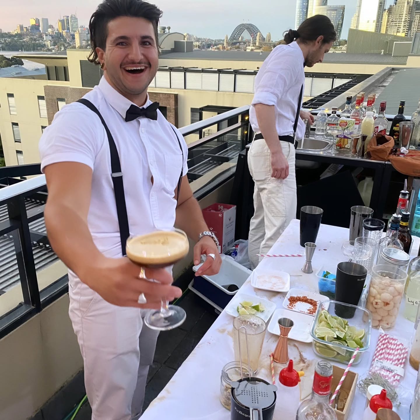 Espresso martini served by a bow tie bartender